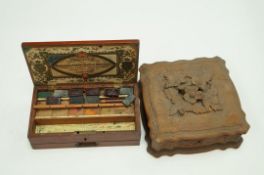 A 19th century mahogany Ackermann and Co. paint box with some original watercolour blocks, 21.