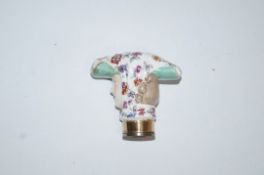 A 19th century continental porcelain figure head cane handle, possibly Meissen,
