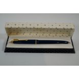 A Parker Junior (1950s) blue with 14ct gold medium nib made in Newhaven, press bar filling,