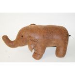 A twenty first century faux leather foot stool in the form of an elephant,