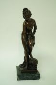 A 20th century bronze of a lady, the base signed "BARYE", on a green marble plinth,