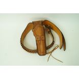 An embossed leather Western style gun holster