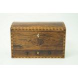 A Victorian rosewood dome top stationary box, with parquetry banding,