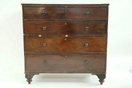 A Victorian mahogany chest of two short and three long drawers with turned handles,