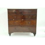 A Victorian mahogany chest of two short and three long drawers with turned handles,