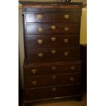 A George III oak chest on chest with two short and three long graduated drawers over three long
