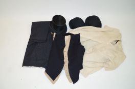 A Christie's silk top hat, two bowler hats, two waistcoats, a pair of striped gentleman's trousers,