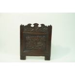 An oak carved fire screen, possibly from a Tudor child's crib head, 56.