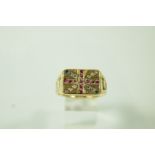 A 9 carat gold Union Jack ring, set with red, white and blue synthetic stones, finger size Z+++, 7.