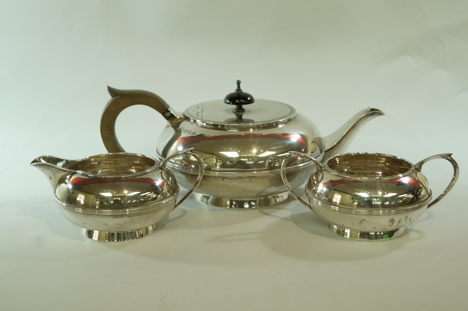 A silver three piece tea service, by J.B.C.