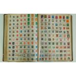 A large early 20th century account book, converted into a stamp album,