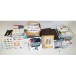 A large collection of stamps, including two albums of Great Britain packs, covers and maximum cards,