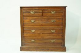 An Edwardian mahogany chest of two short and three long drawers on plinth base, 101cm high,
