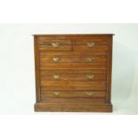 An Edwardian mahogany chest of two short and three long drawers on plinth base, 101cm high,