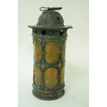 An Arts and Crafts style copper hanging wall lantern, with pierced domed top,