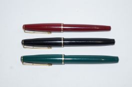 A Parker 17 Lade (1964) (3 off) green, maroon & black, covered points,