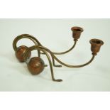 A pair of Carl Deffner copper candlesticks, with ball supports,