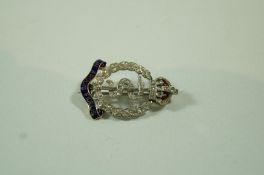 A Royal Medical Corps diamond and enamel sweetheart brooch, 3 cm long, 5.