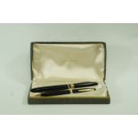 A Sheaffer Saratoga (1952) black fountain pen and matching pencil, 14ct no.