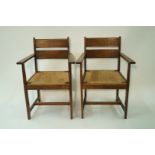 A set of four oak Arts and Crafts style chairs, each with double oak plank back,