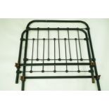 An early 20th century single iron bed frames,