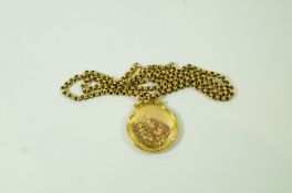 A locket, of circular outline, 2.7 cm diameter; on a chain tagged '9c', 45 cm long, 3.