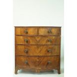 A 19th century mahogany bow fronted chest of two short and three long drawers, 104cm high, 101.