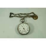 A silver open faced pocket watch; with a watch chain,