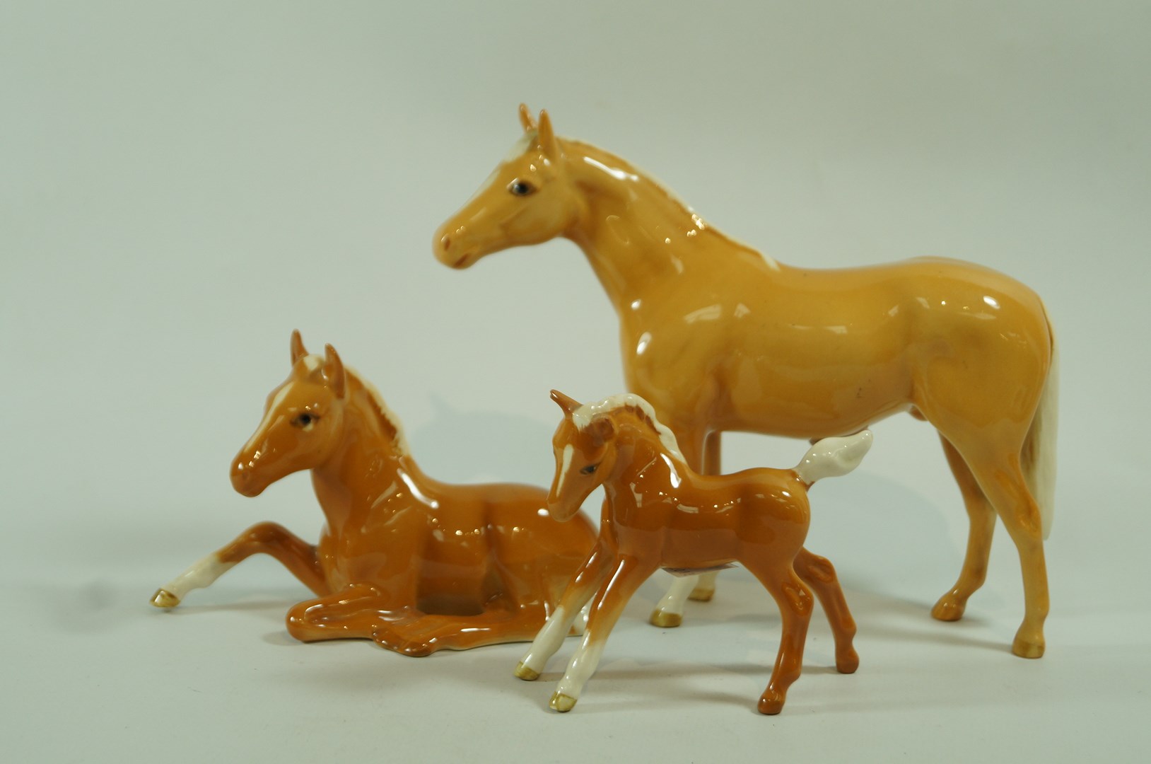 A Beswick figure of a palomino horse,