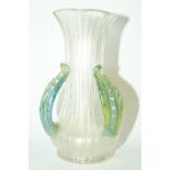 A Loetz style glass vase, of flared form with three green leaf form handles,