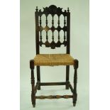 A 17th century style chair, with bobbin turned back,