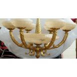 A modern six branch gilt metal chandelier,