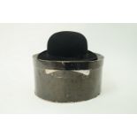 A Batterrby and Co silk top hat together with a G.H.