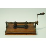 A late 19th century/early 20th century wooden flower press, 29.