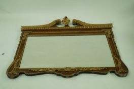 A George I style over mantel mirror with mahogany and parcel gilt frame, 108cm high,