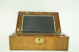 A Victorian walnut and brass bound writing slope, with brass inset tablet,