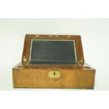 A Victorian walnut and brass bound writing slope, with brass inset tablet,