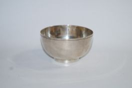 A silver bowl, maker J.H.O., London 1969, of plain form on a rim foot, 5.3 cm high, 9.8 cm across.