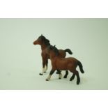 Two Beswick bay models of foals,