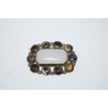 A Victorian gilt metal agate set brooch, 4.