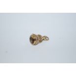 A 9ct gold seal charm, set with a round cut citrine, 2.5 cm long, 7.