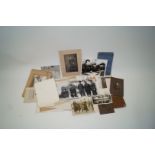 A collection of military photos, booklets, greetings cards,