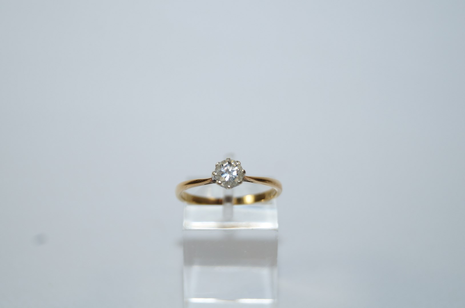 A single stone diamond ring, indistinctly stamped, the brilliant cut of approximately 0. - Image 2 of 2