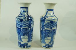 A pair of Chinese vases each with flared rims,