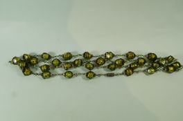 A row of Italian glass beads, 130 cm long,