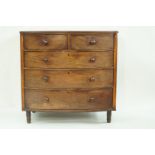 A 19th century mahogany bow fronted chest of two short and three long drawers with turned handles,