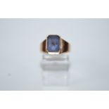 A 9ct gold blue stone set ring, finger size P, 4.