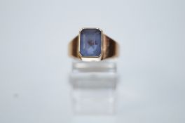A 9ct gold blue stone set ring, finger size P, 4.