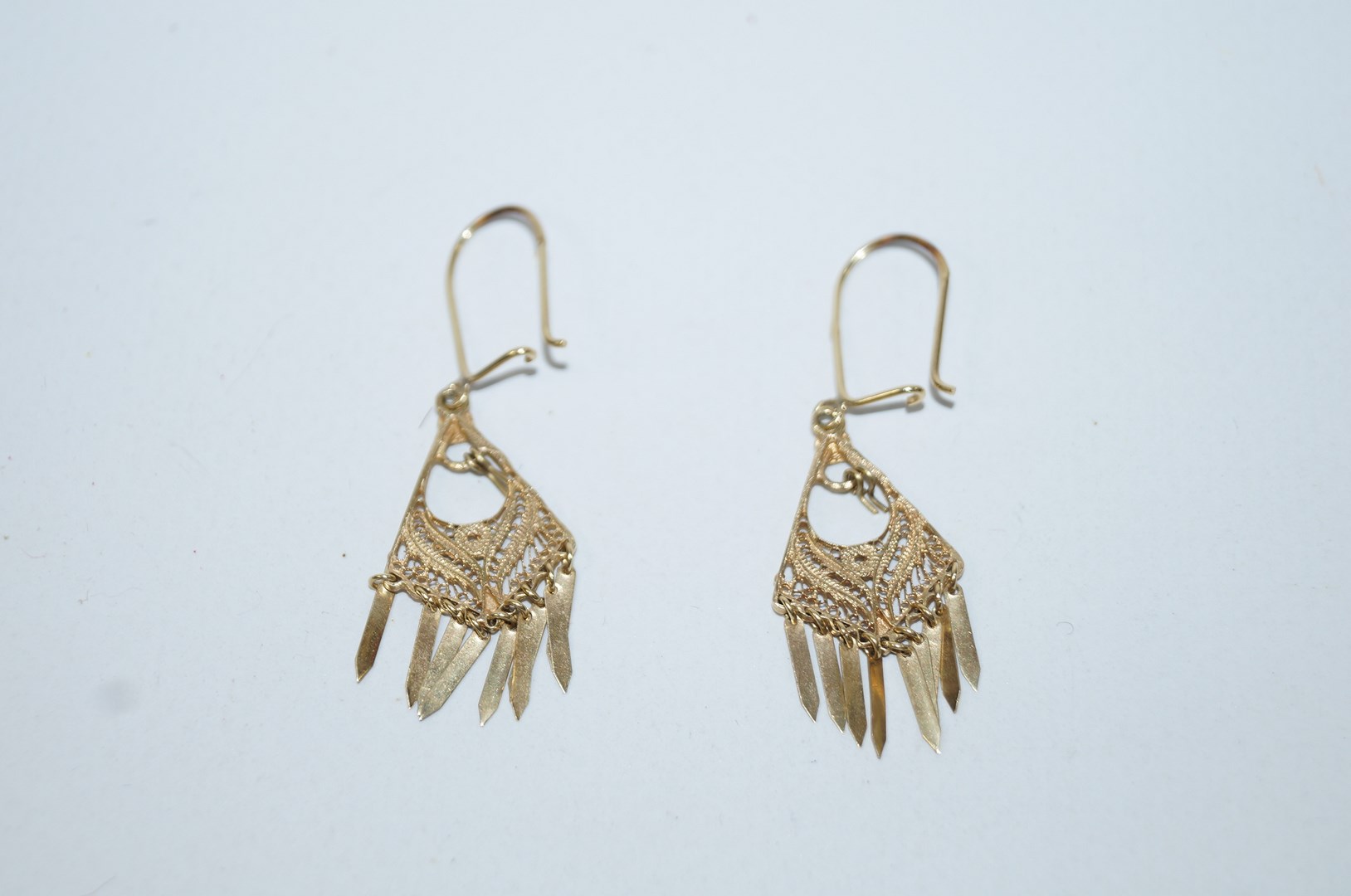 A pair of continental filigree drop earrings, stamped '14K' to the wires, 3.