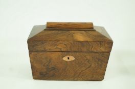 A Victorian rosewood tea caddy of sarcophagus form, 16cm high, 22cm wide,
